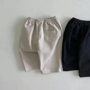 Новые осенние детские однотонные простые Универсальные широкие брюки для девочек, повседневные брюки со свободными карманами для мальчиков, хлопковые удобные брюки для мальчиков